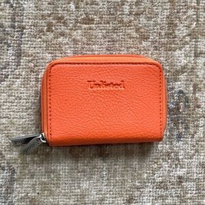 Unlisted Orange Wallet